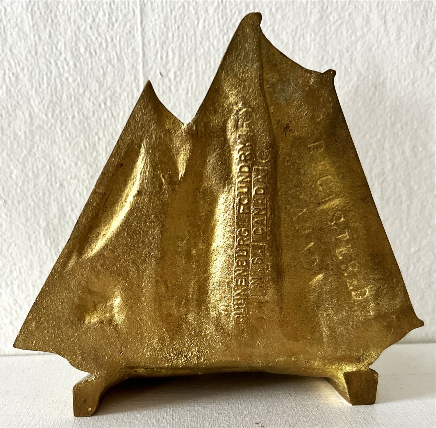 Home, Artifact, Two Brass Blue Nose Bookends, Front view